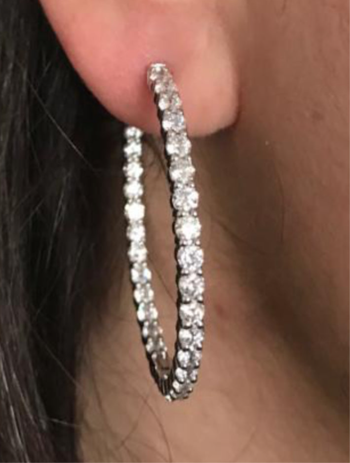 Inside out Large VVS1, VVS2 - Color less F, G - 7 CT Diamond set in White Gold 