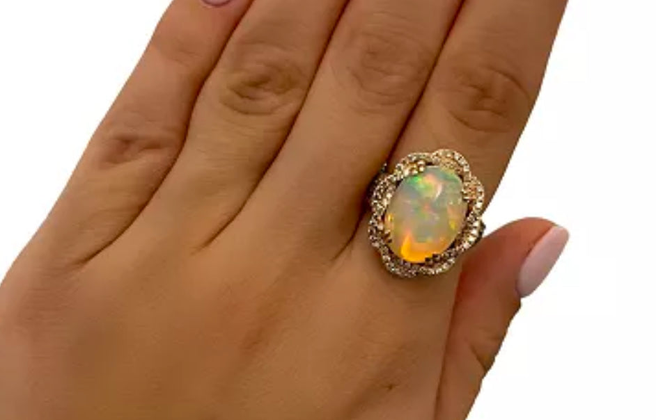 Levian Neopolitan Opal™ (4-1/2 ct. t.w.) ring, set in a braided halo of Nude Diamonds™ with Chocolate Diamonds® (over 1 ct. t.w.) shimmering from the openwork shank in 14k Rose Gold- size 10