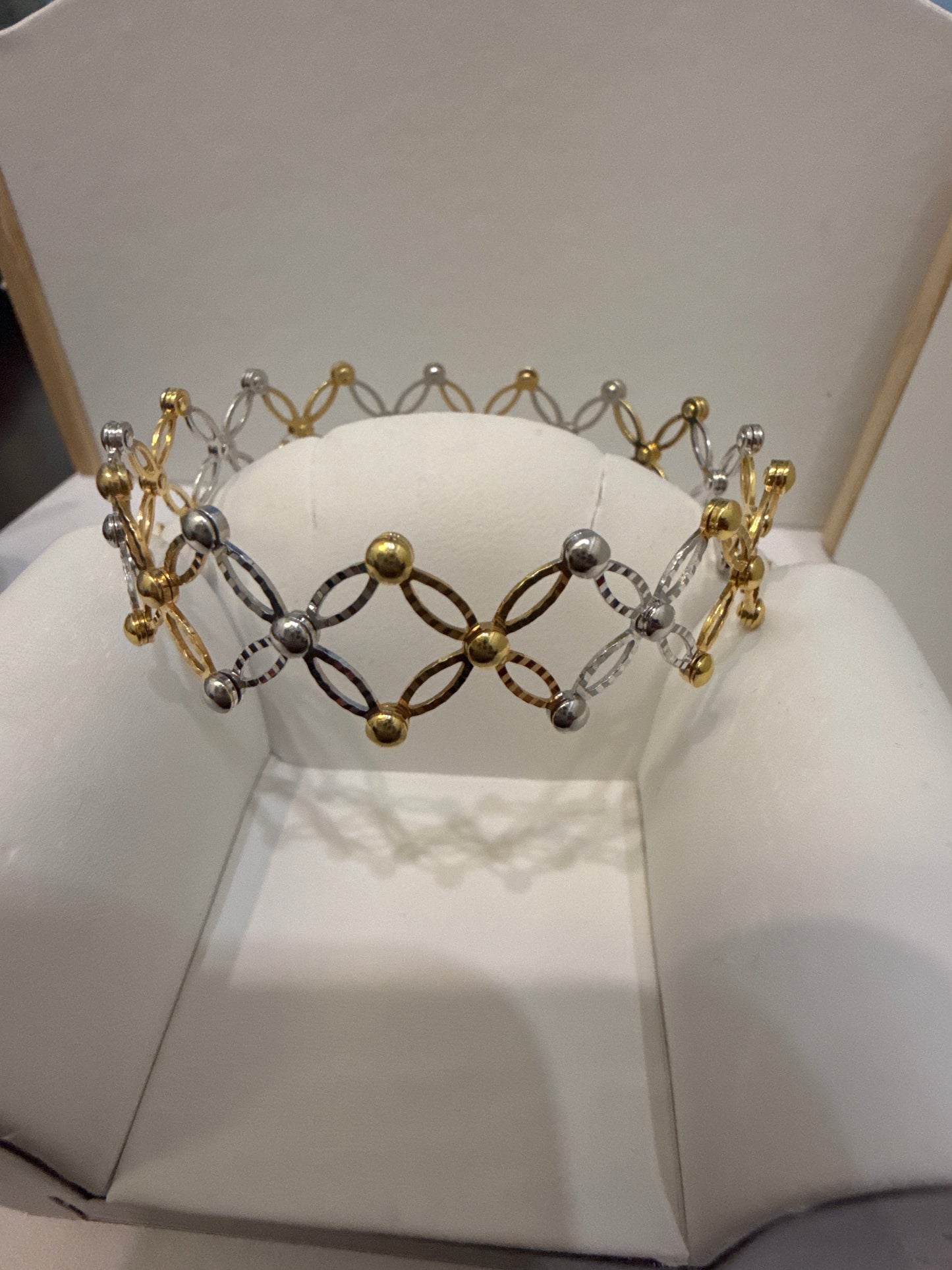 Expendable Ring to Bangle Design in Bicolor 18k Gold Bangle. 12.9g SKU: BA013