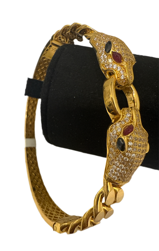 Classic Custom Design Cuff Bracelet with Two Panther Heads with a Ring with over 6 CT Ruby, Sapphire and Natural Crystals in 22K Gold. SKU: BR056