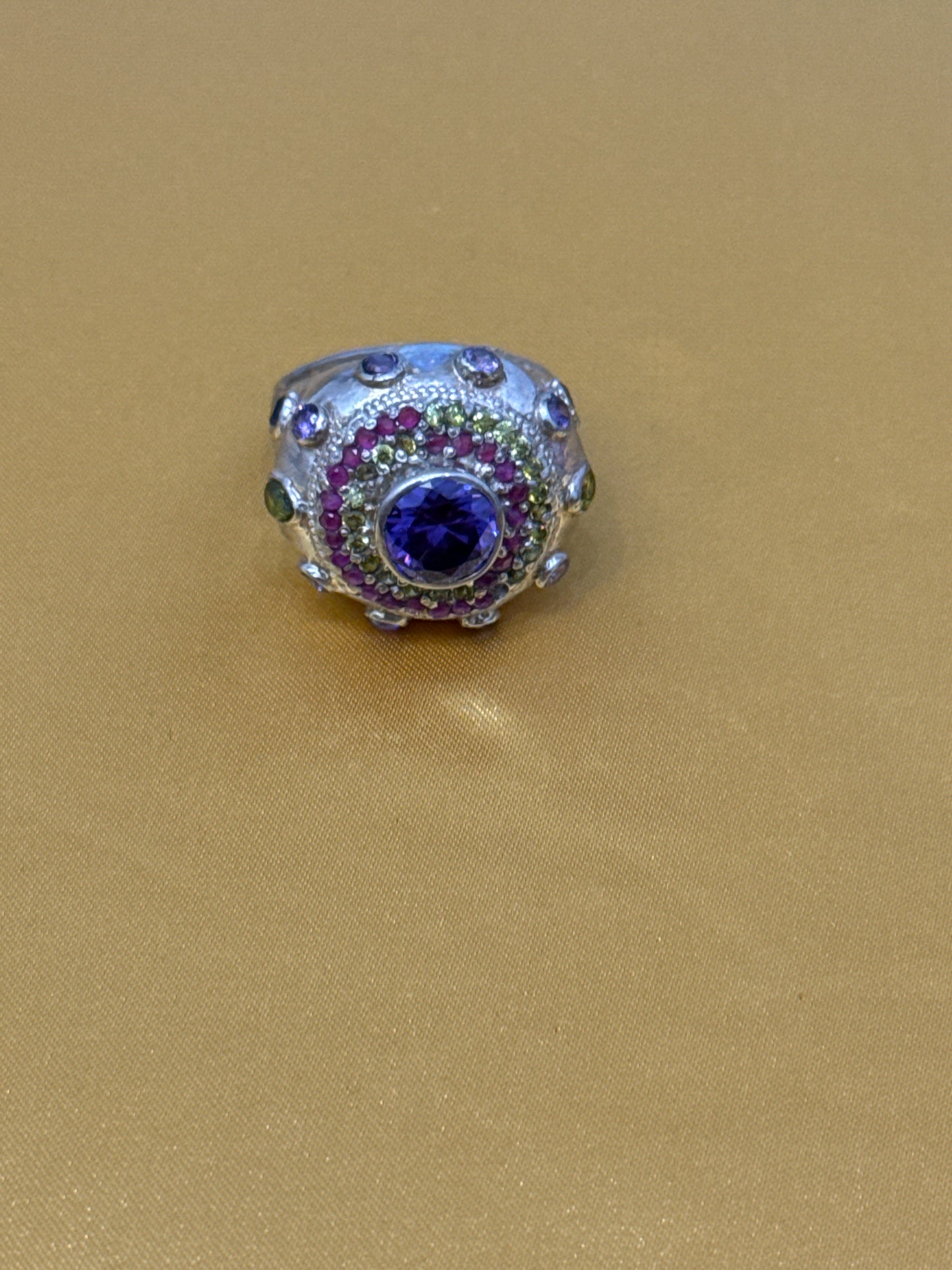 Traditional Rajasthani / Afghani One-of-a-Kind Cocktail Ring with 10 CWT Ruby, Peridot, IOLITE and Spinel in Sterling Silver Size: 10.5 Weight: 10.8 SKU: RS005W
